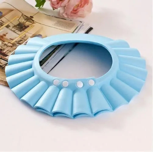 Adjustable waterproof EVA baby shower cap in blue with ear detail, 29x26cm