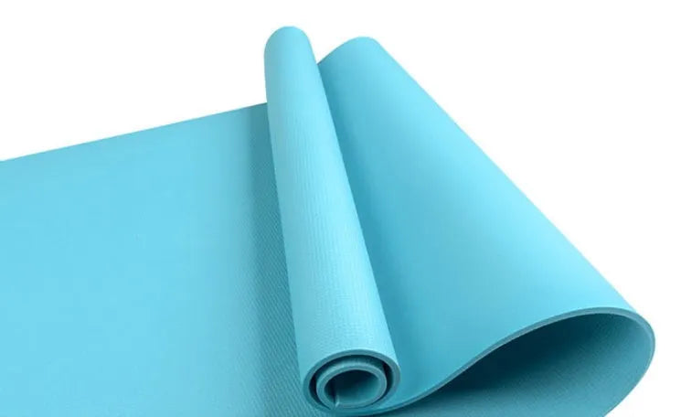 EVA yoga mat in blue showing thickness options of 4mm and 6mm with non-slip texture