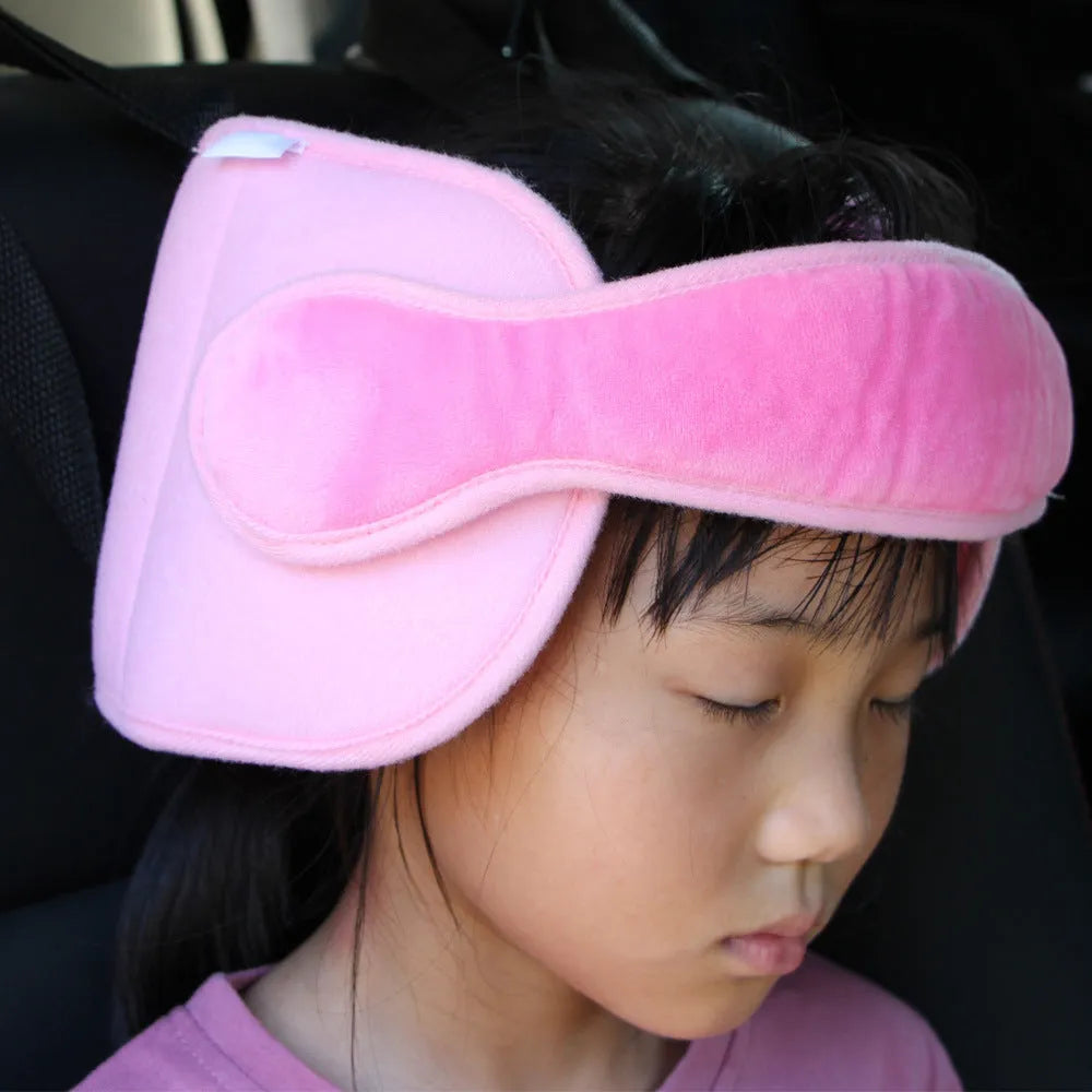Child car seat head support in blue with hook and loop neck strap and rear waistband