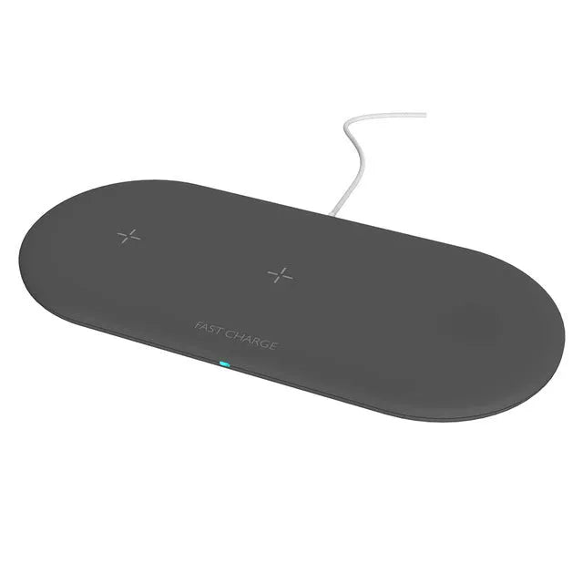 Black three-in-one wireless charging station for iPhone, Apple Watch, and headphones on a desk