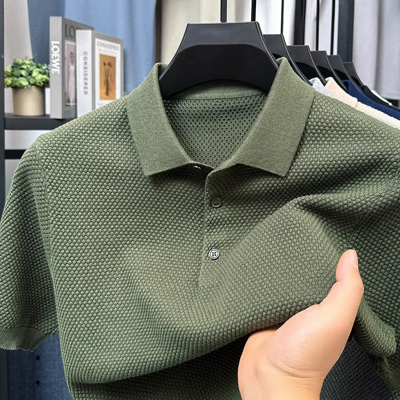 Loose fit pure cotton short sleeve pullover sweater shown in various colours including grey and navy.