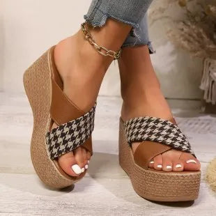 Brown and black cross leopard plaid pattern wedge sandals with a rubber sole.