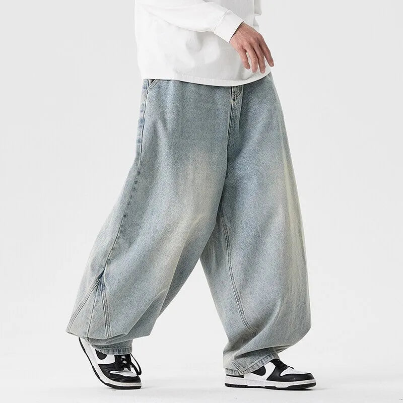 Men's plus size wide leg casual jeans in dark blue denim with straight leg opening