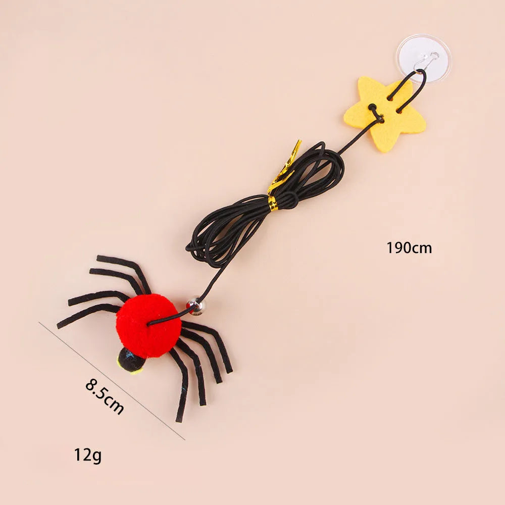 Cat hanging door toy with elastic rope, feather stick, bell, and spider decoration in red or yellow colours