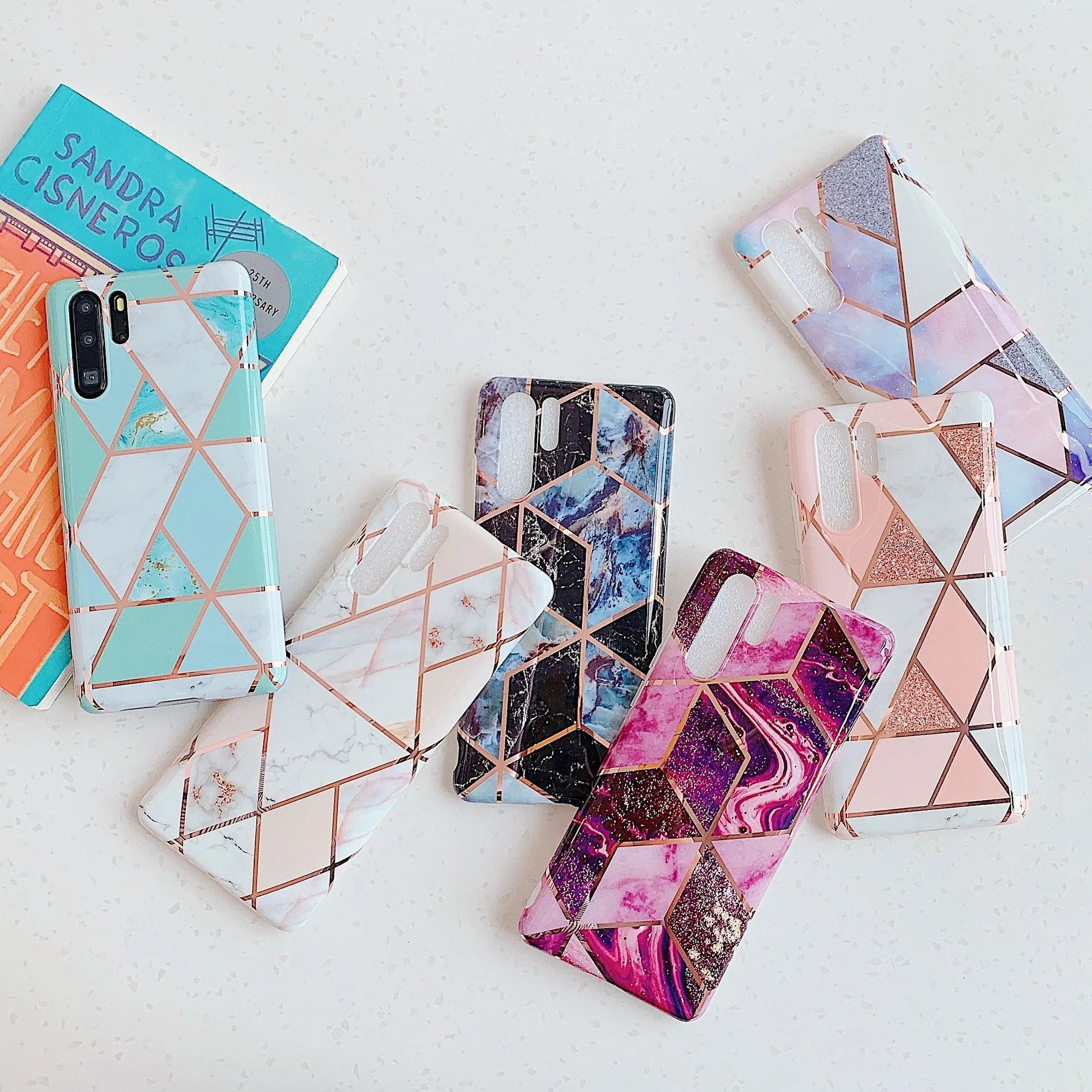 Electroplated marble finish TPU back cover case for Huawei and Samsung smartphones in multiple colours.