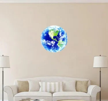 Glow in the dark 3D planet Earth wall sticker on a dark blue background, showing its luminous effect.