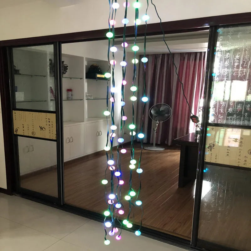 64 LED dazzler shower tree light string on a Christmas tree showing cascading lights with IP44 outdoor rating