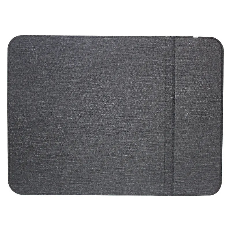 A grey foldable cloth phone holder open as a stand, with a smartphone charging on it.