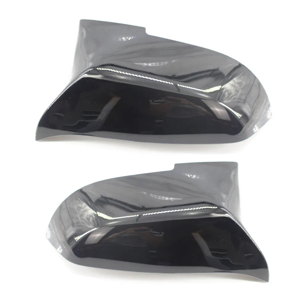 Paint bright black replacement rear-view mirror shell for BMW 3 Series and 4 Series F-model vehicles.