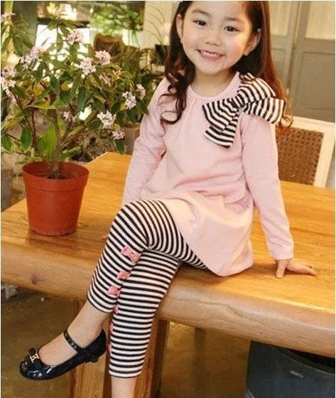 Pink cotton girl clothing set with top and trousers in children's sizes