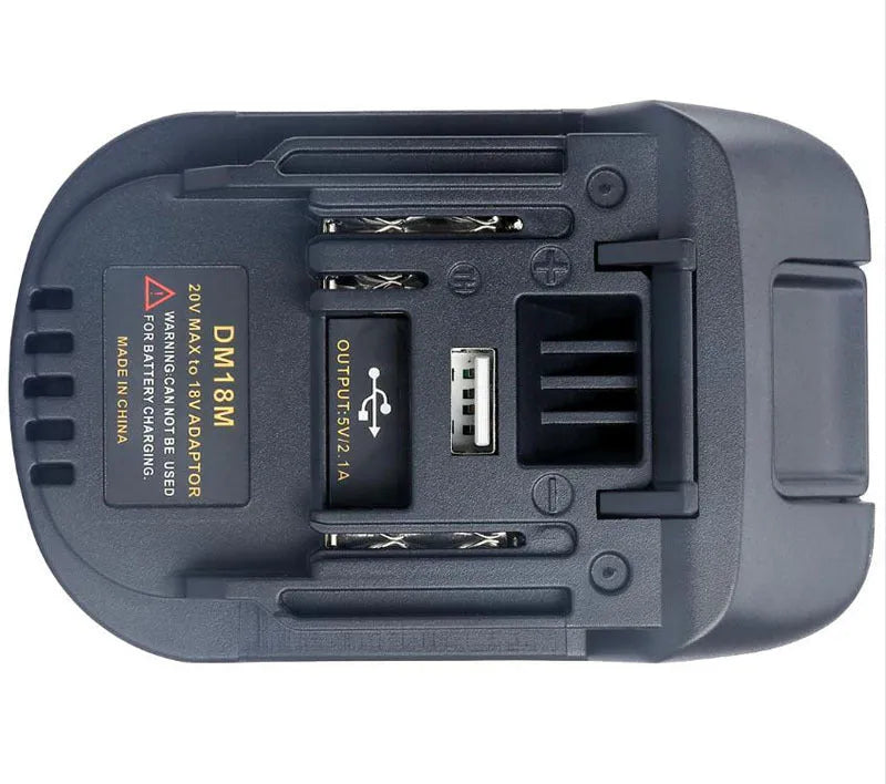 Black plastic battery adapter connecting Milwaukee DM18M tools to Makita H99F battery packs