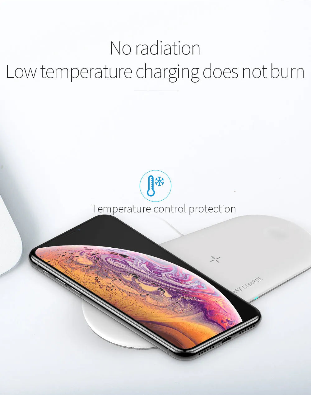 Black three-in-one wireless charging station for iPhone, Apple Watch, and headphones on a desk