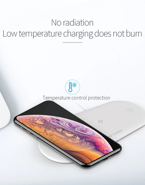 Black three-in-one wireless charging station for iPhone, Apple Watch, and headphones on a desk