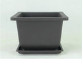 Dark brown antique-style recycled plastic flowerpot showing rectangular and square size options.