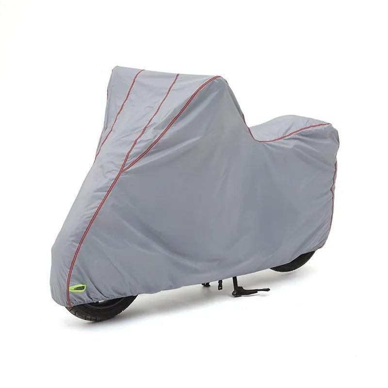 Thick nylon PVC coated motorcycle cover in black green, size L, on a dark background