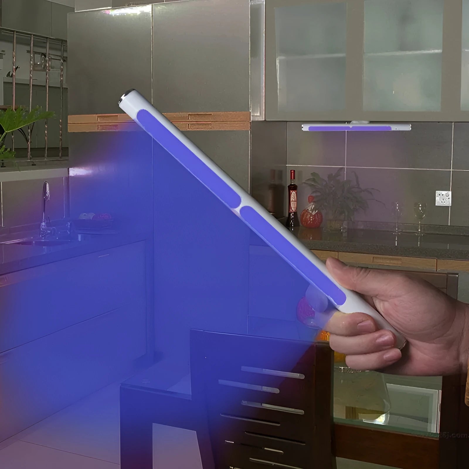 Silver handheld UV disinfection stick on white background, USB rechargeable, 20x300mm, PC aluminium construction