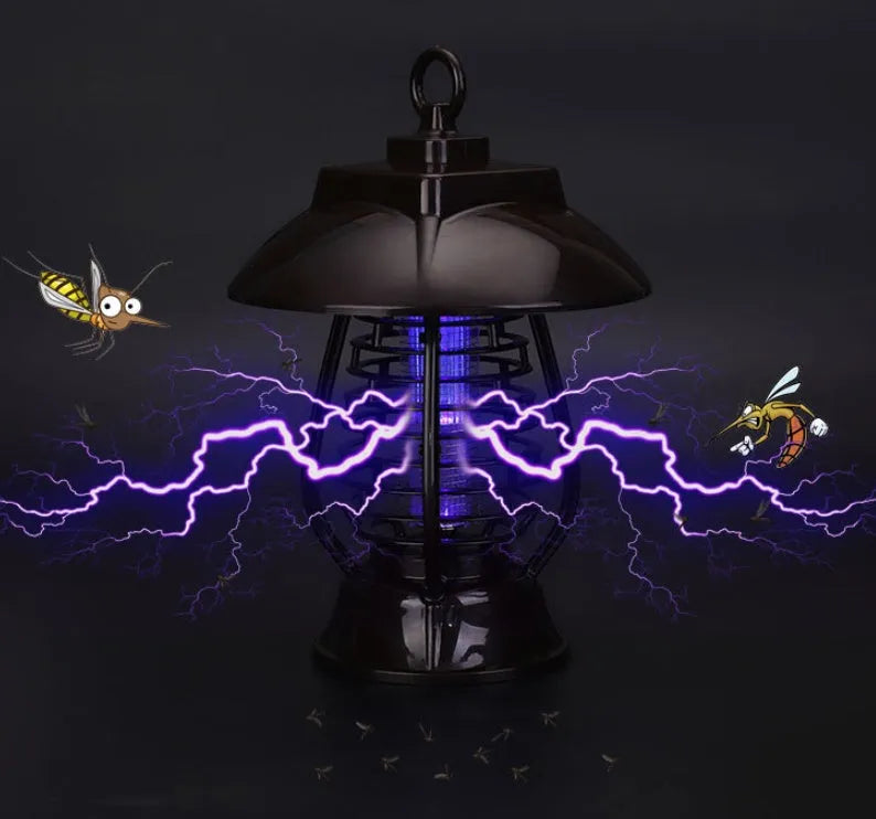 White and purple solar-powered mosquito lamp for outdoor garden use with solar panel and LED lights