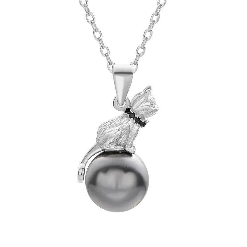 Sterling silver cat pendant necklace on a chain, showcasing the feline design in an elegant style.