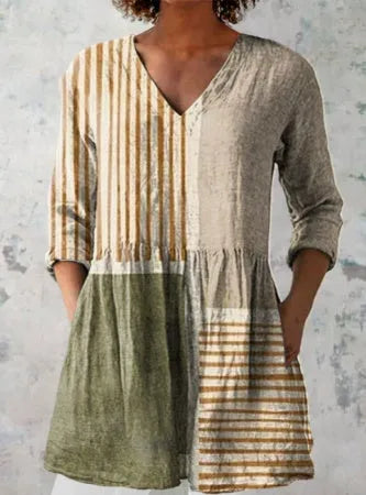 Women's printed wave pattern loose dress with wide waist and 3/4 length sleeves.