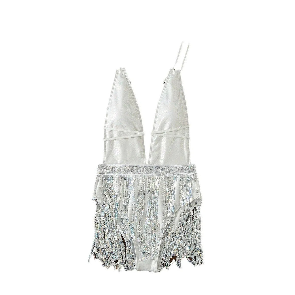 White one-piece swimsuit with deep V-neckline and tassel detail on a brief-cut, sleeveless design.