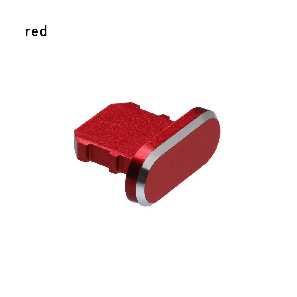Aluminium alloy dust plug for iPhone charging port in various colours including gold, silver, blue, and rose gold.