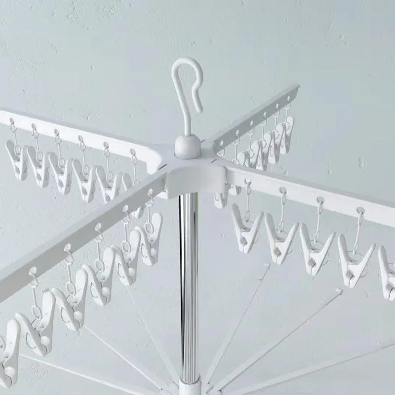 Three-layer stainless steel mobile drying rack with plastic clips for socks, ties and clothes hangers