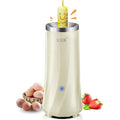 Beige white and green coloured multifunctional mini breakfast machine on a kitchen countertop.