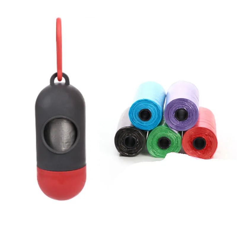 Roll of multi-coloured dog waste bags showing black, blue, green, and pink examples
