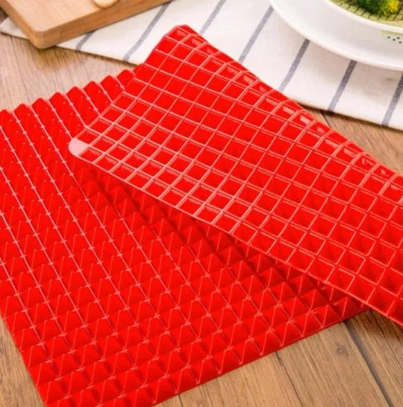 Red silicone pyramid grid cooking mat for oven and BBQ use