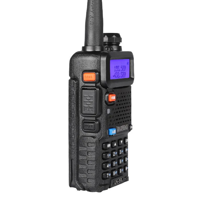 Handheld VHF UHF walkie talkie radio showing compact dimensions and antenna