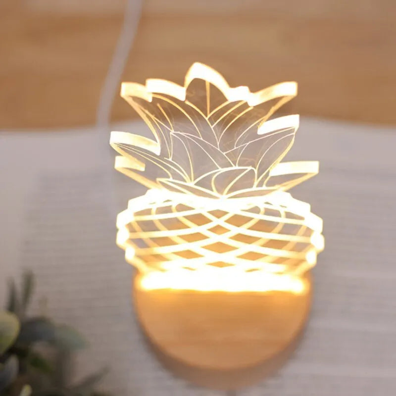 Cartoon pineapple shaped bedside table lamp with wooden base and acrylic body on a white surface.