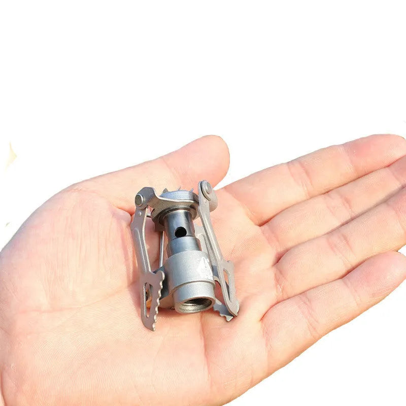 Portable camping gas stove with one-piece propane burner design