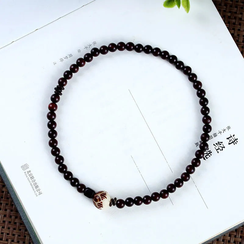 Natural rosewood double-ring bracelet with 10mm flower-shaped beads and hand-knitted construction