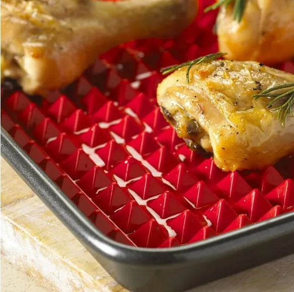 Red silicone pyramid grid cooking mat for oven and BBQ use