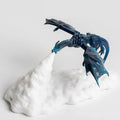 3D-printed red dragon night light with glowing warm light effect on a dark background.