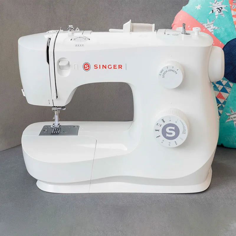 M2405 portable sewing machine with accessories on tabletop