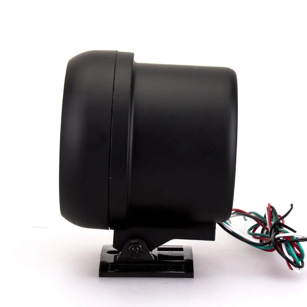 Black automotive tachometer with blue light pointer on a 0-8000 RPM scale