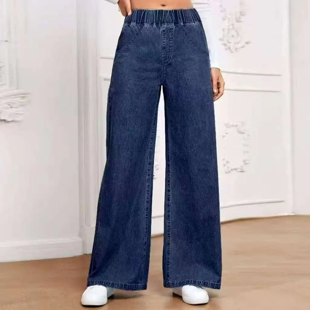 Light blue washed wide-leg jeans with straight leg cut and zip fly