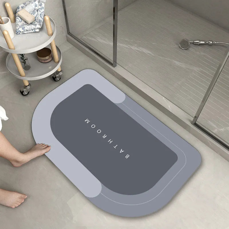 Blended fabric bathroom floor mat in blue, available in oval and rectangular shapes