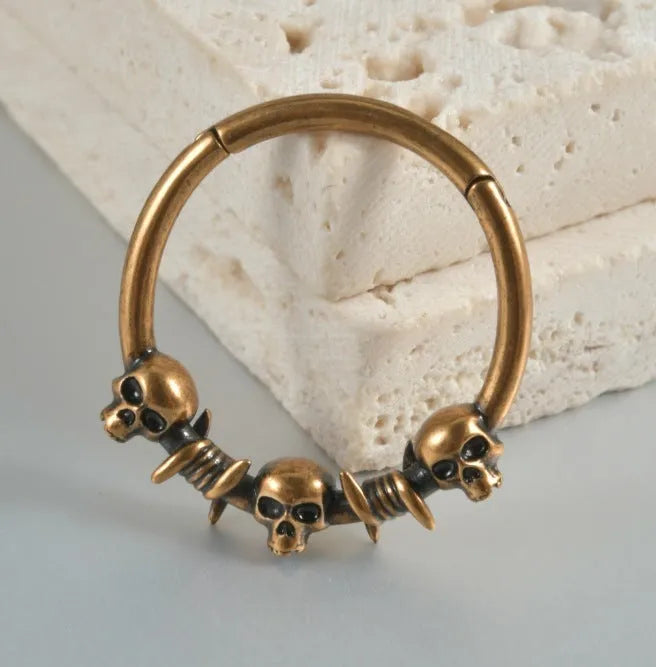 Copper vintage punk earrings with ghost head charms in antique silver or ancient gold finish.