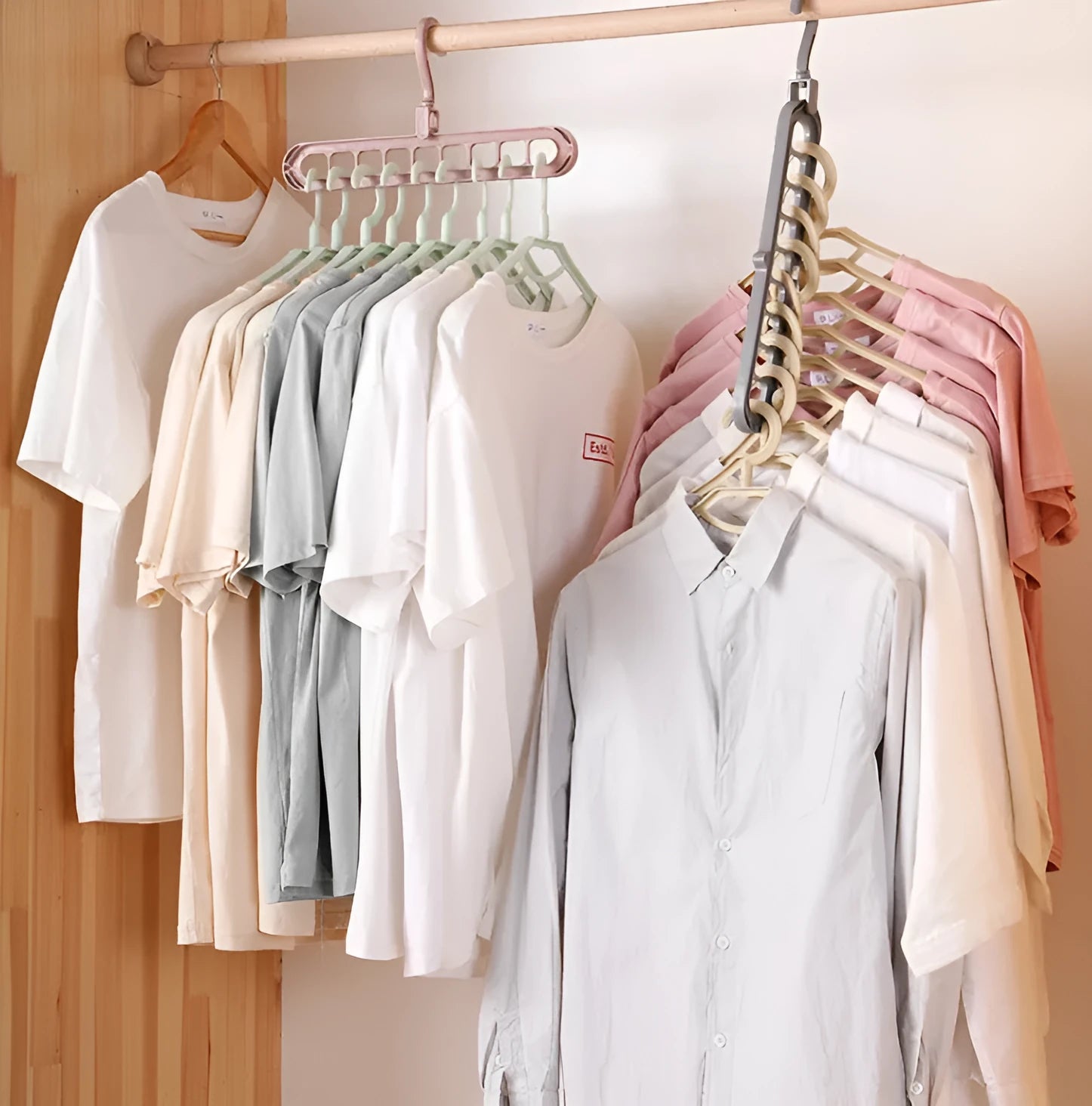 Plastic clothes storage hanger with rotating hook, shown in available colours.
