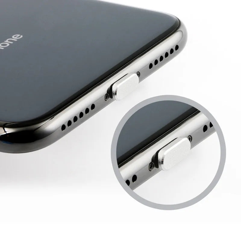 Aluminium alloy dust plug for iPhone charging port in various colours including gold, silver, blue, and rose gold.