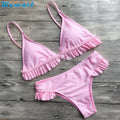 Womail women's push-up padded bra bikini set in white, showing top and bottom on model