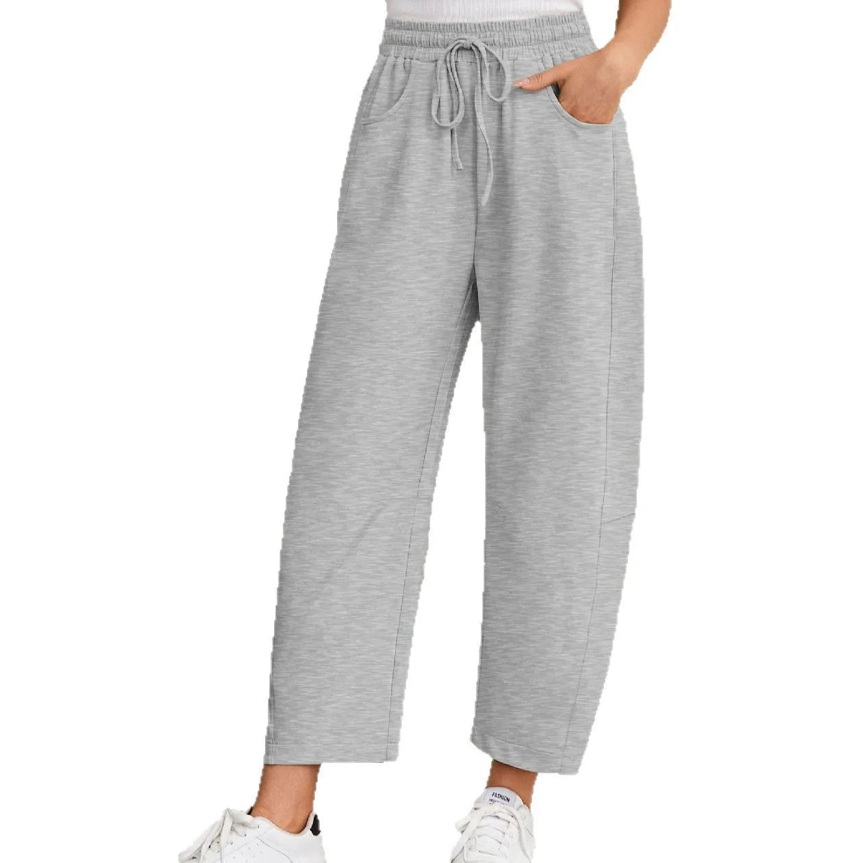 Women's loose cropped sweatpants with drawstring elastic waist and side pockets in street fashion style