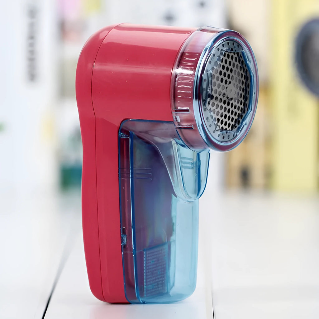Blue portable electric lint remover for clothing with compact 11x16x9.5cm design