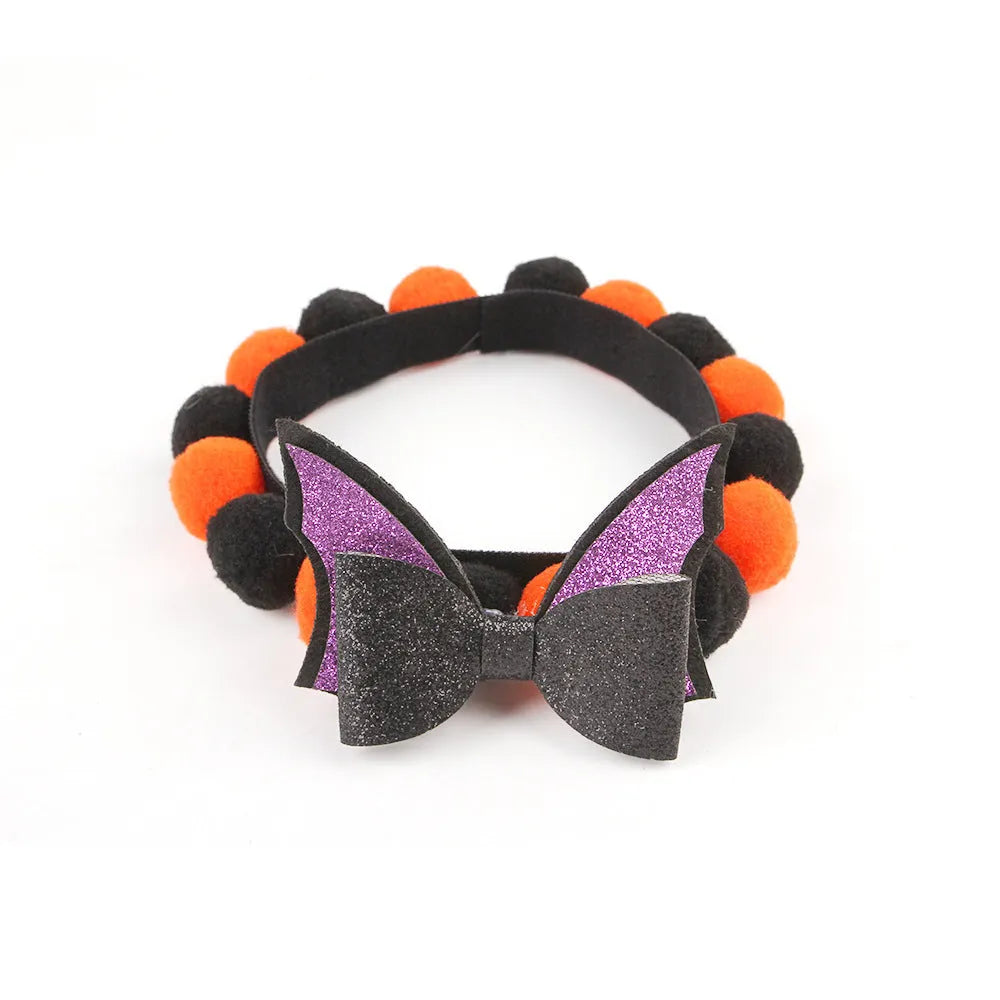 Halloween pet fur ball collar in six designs including pumpkin, skull, and witch themes