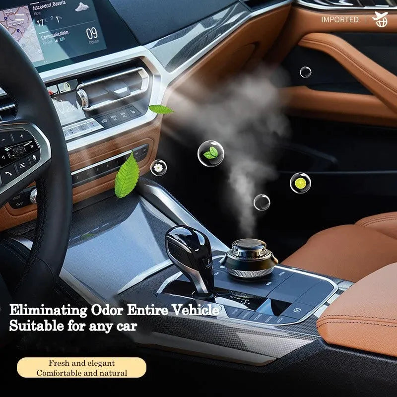 Solar powered kinetic car air freshener with rotating double rings on black plastic base