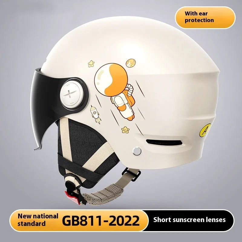 Khaki coloured motorcycle half helmet with a long visor on a solid background.