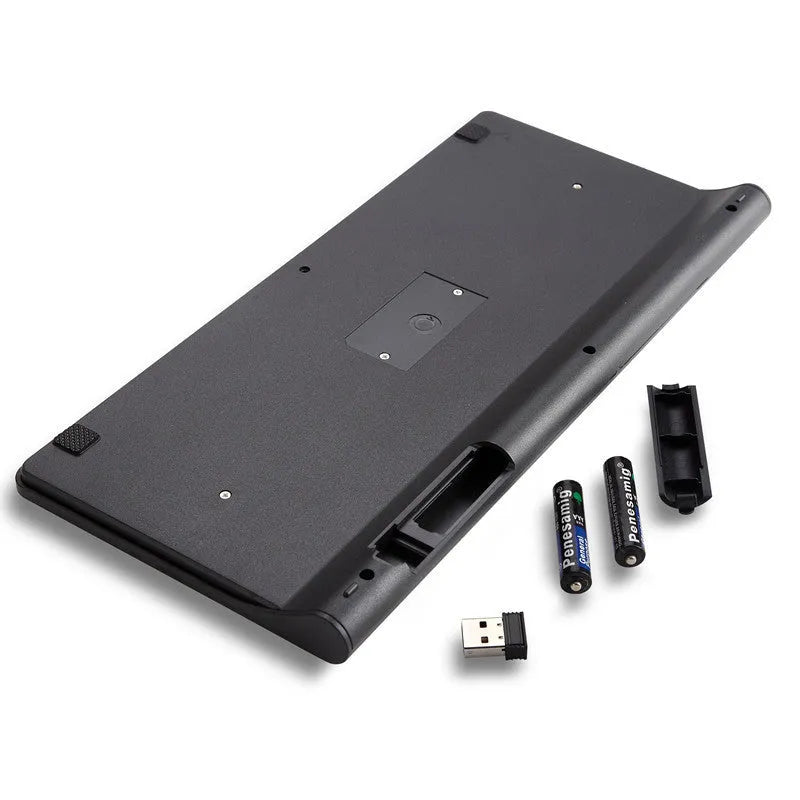 Black and white wireless keyboard and mouse set on wooden desk with 2.4GHz USB receiver