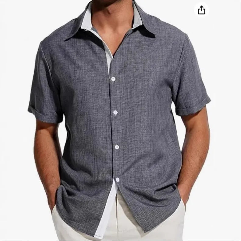Man wearing a short sleeve floral print shirt in cardigan style, suitable for summer.